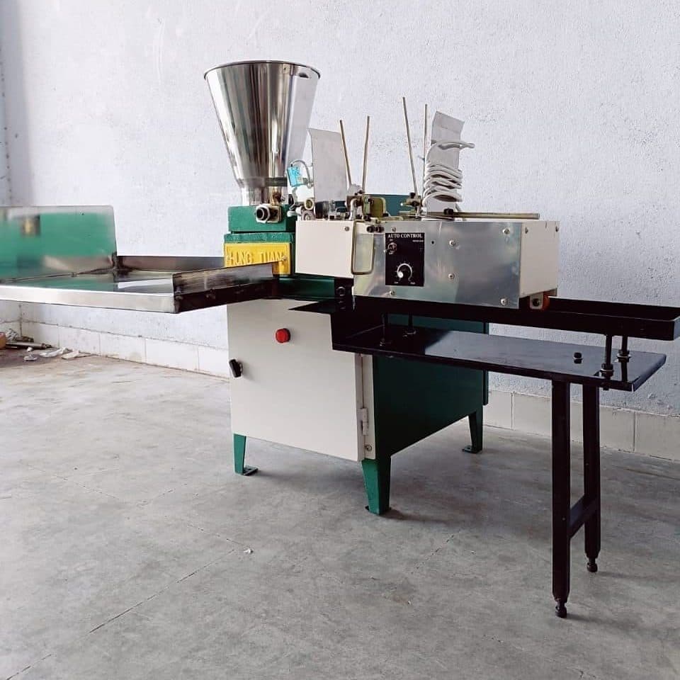 Fully automatic agarbatti machine with conical masala hopper, stick feeder, auto control panel and black output rack