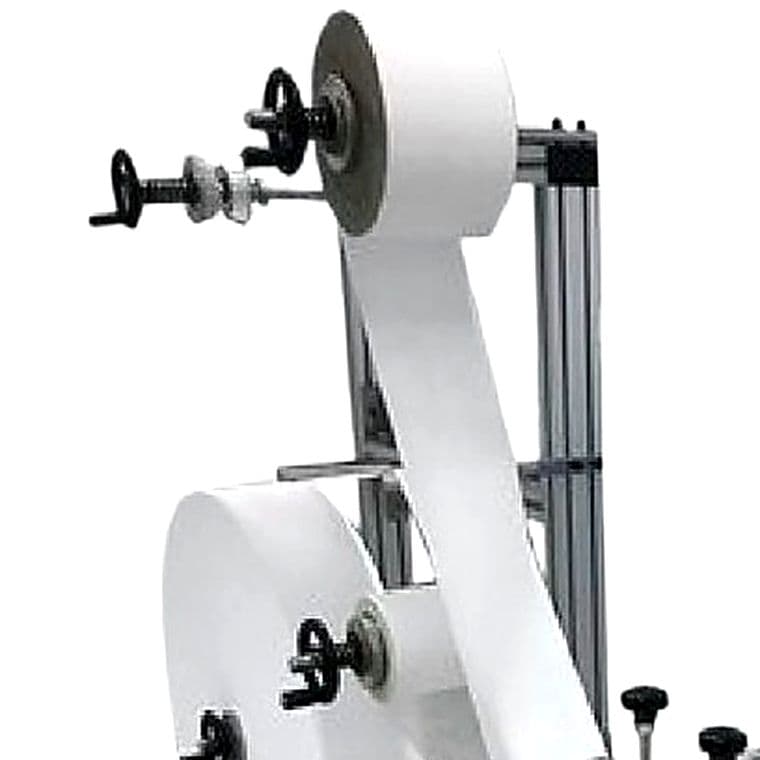 Reels of white non-woven fabric used for the top sheet of sanitary pads