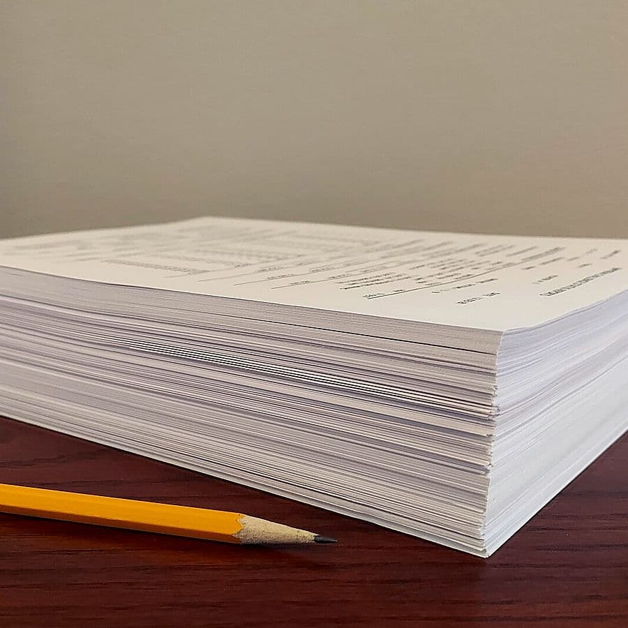 Stack of cut paper sheets of the kind used as plate blanks