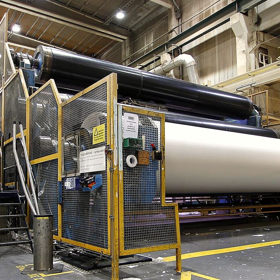 Large reel of coated paper on a paper machine