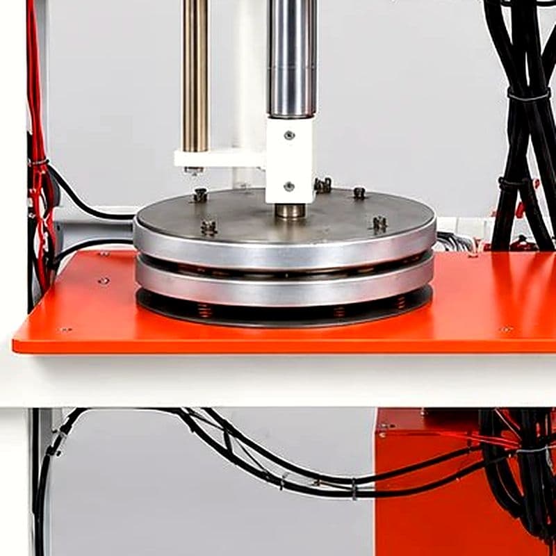 Round plate die set used on a paper plate press