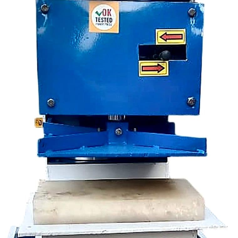 Nylon cutting block on the bed of a slipper cutting press